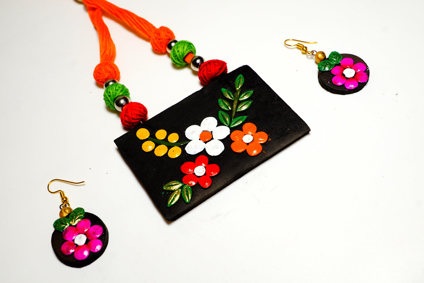 Terracotta Necklace Set with Earrings | Black rectangular shape Pendent with red, white, and golden flowers |